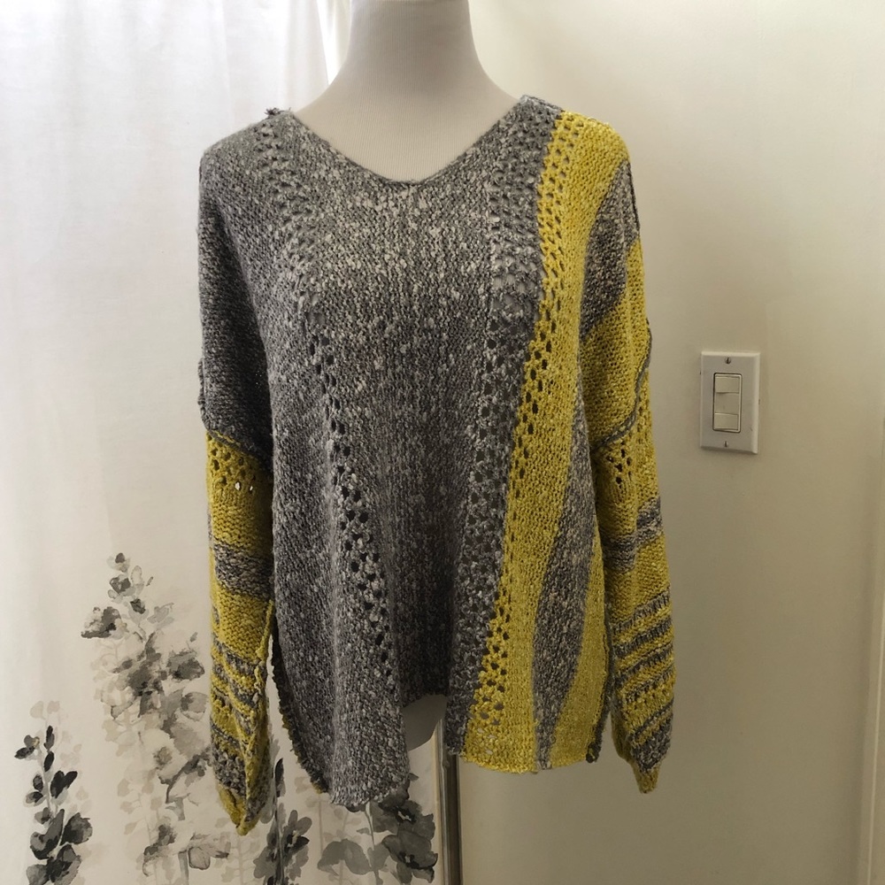 Hem and thread oversized sweater